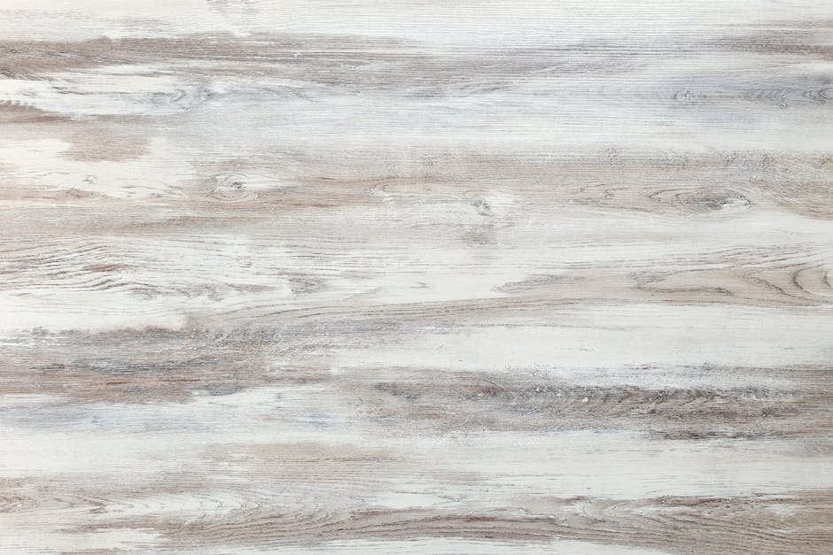 Close-up of a rustic hardwood surface featuring natural wood grain and texture, ideal for backgrounds.