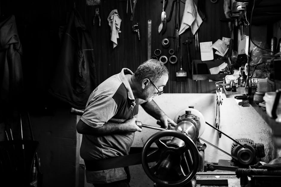 Skilled artisan at work in an Istanbul workshop, focused on crafting using traditional tools.